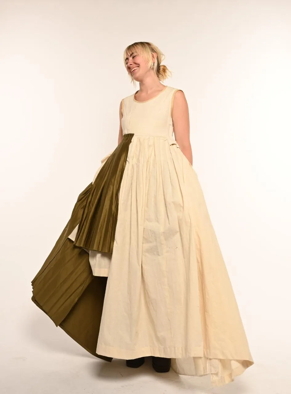 Full Circle cover — the model reclining in the cream cotton gown with its olive silk train spread across the studio floor.