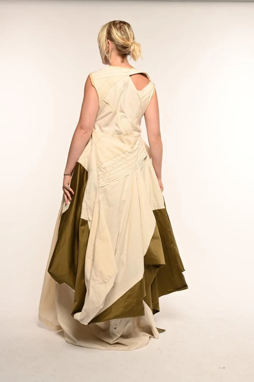 Back view — the cut-out back bodice and layered cream-and-olive skirt shown standing.