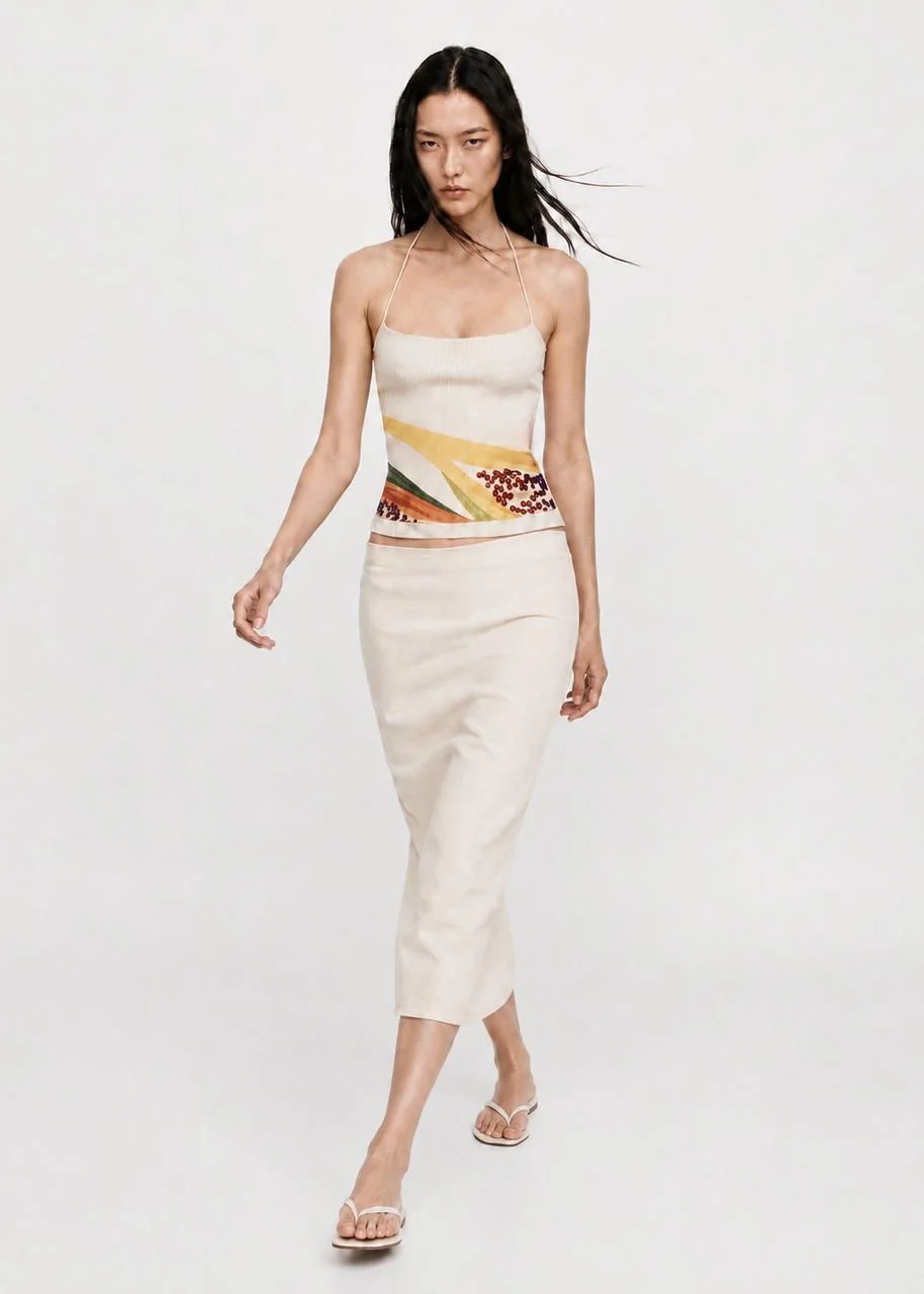 Zesty top walking, full-length front view with the print sitting at the waist.