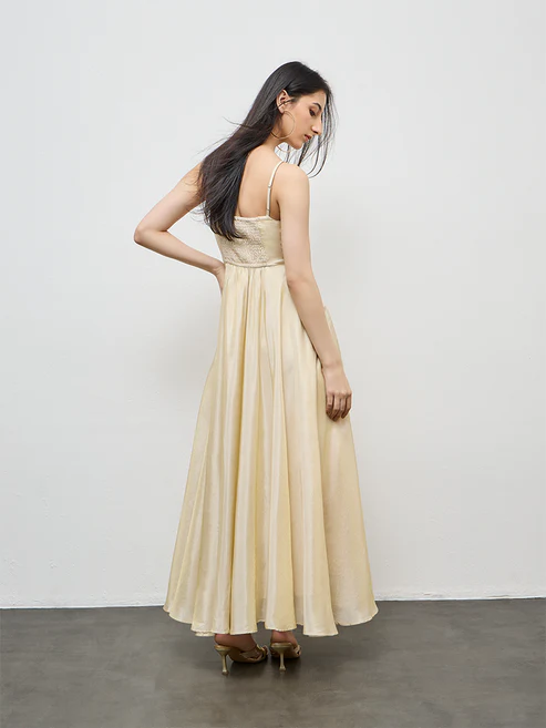 Finished gown, full back view showing the smocked back and circular skirt.